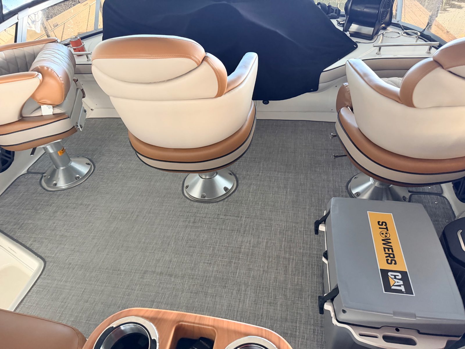 Wonder-Weave marine woven vinyl flooring installed across a boat deck with captain's chairs