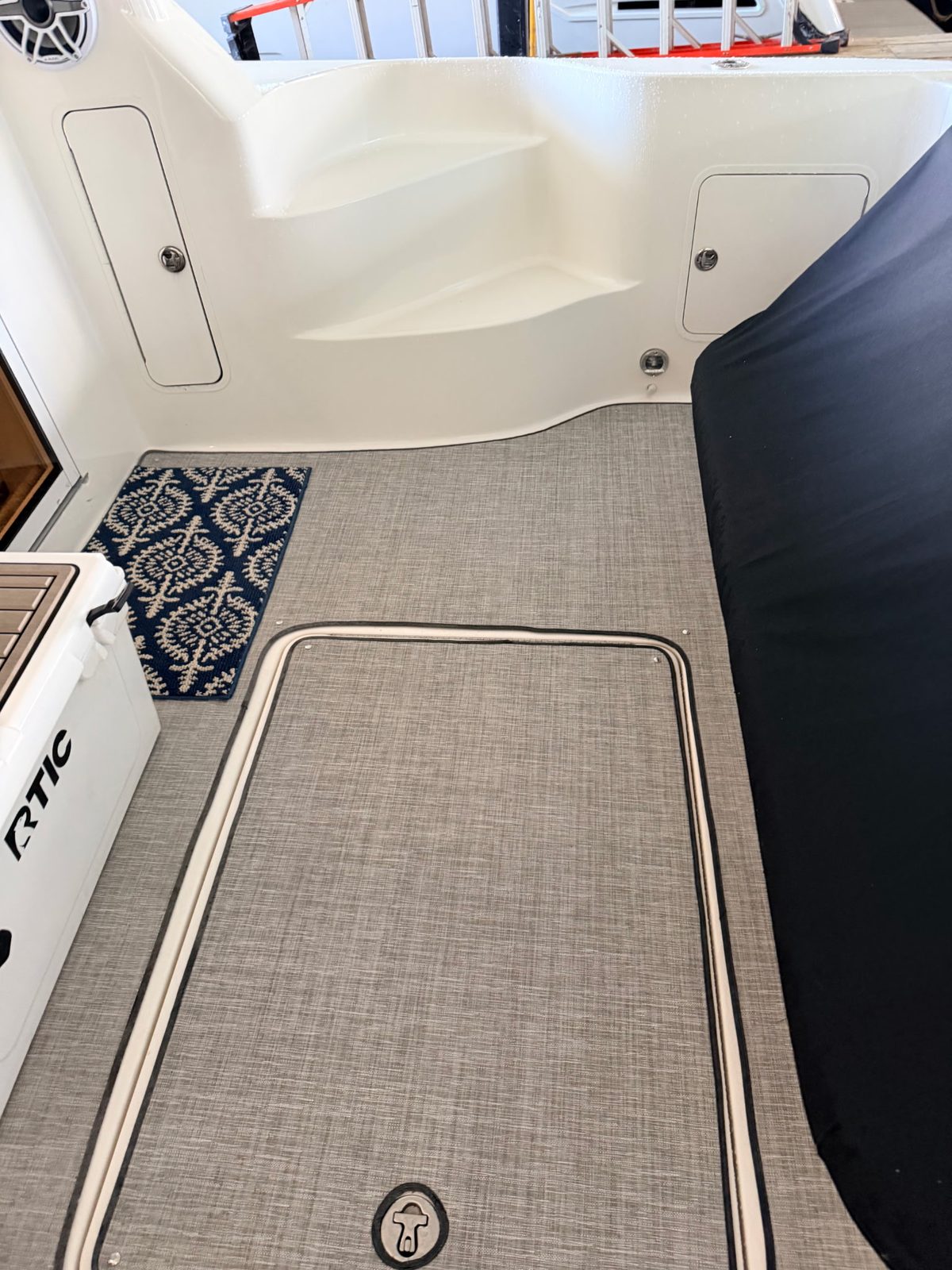 Marine woven vinyl on a boat swim deck and rear cockpit
