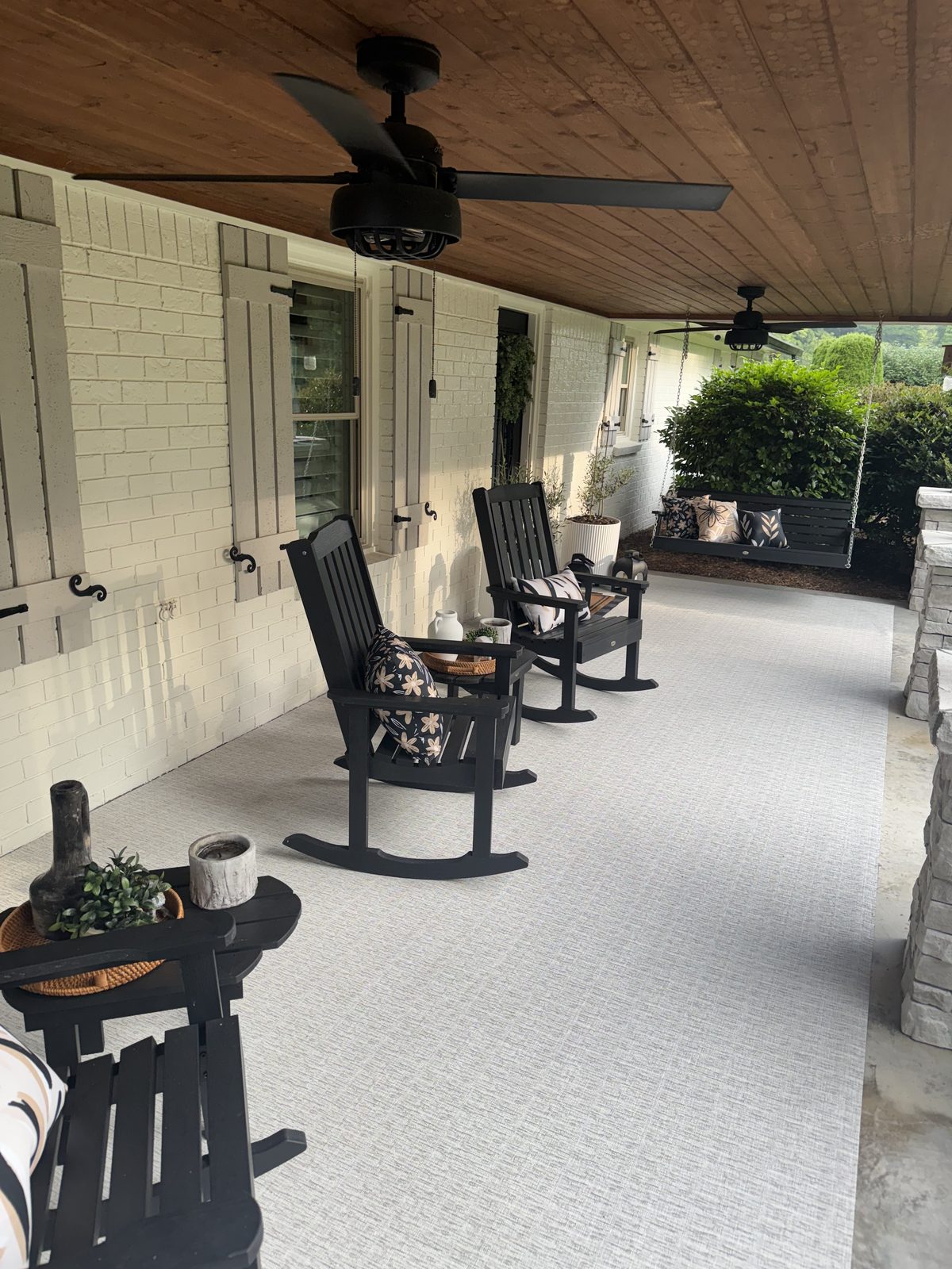 Architectural woven vinyl flooring on a covered residential porch